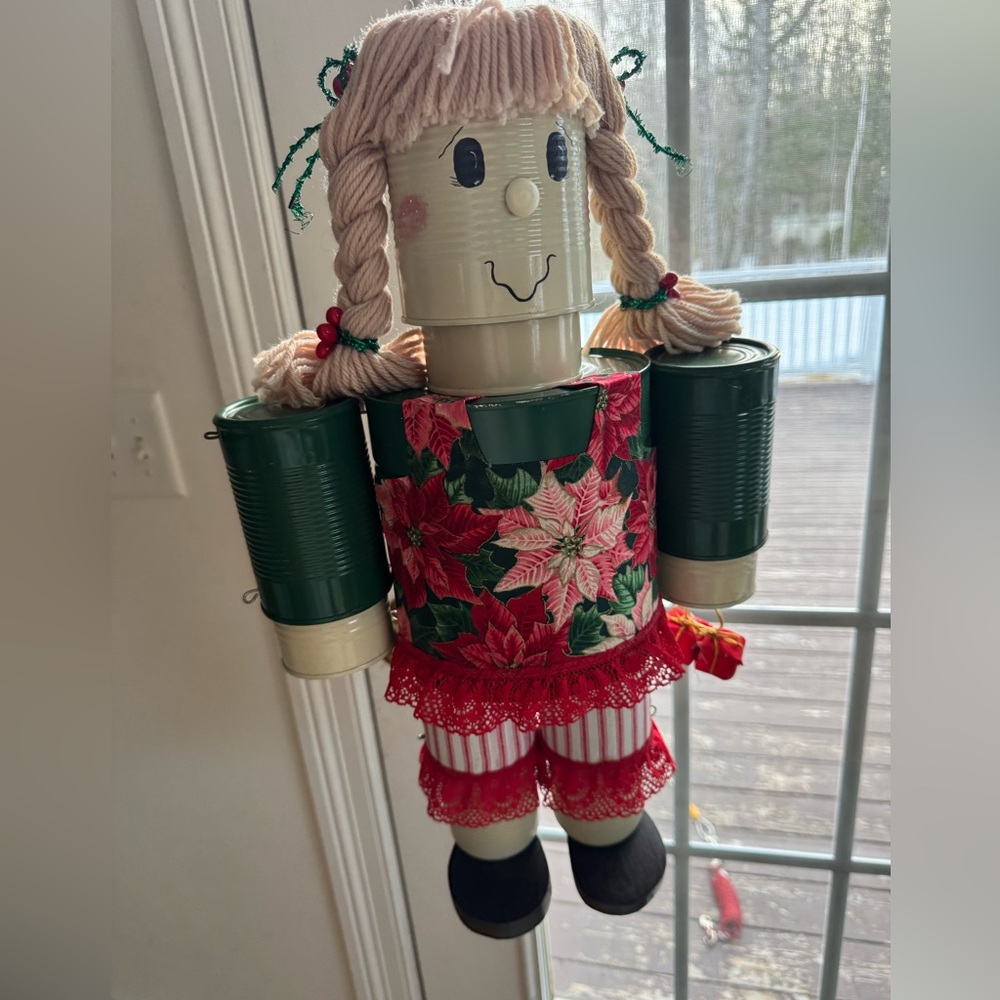 Tin can Doll home made out of cans  with Poinsettia Dress